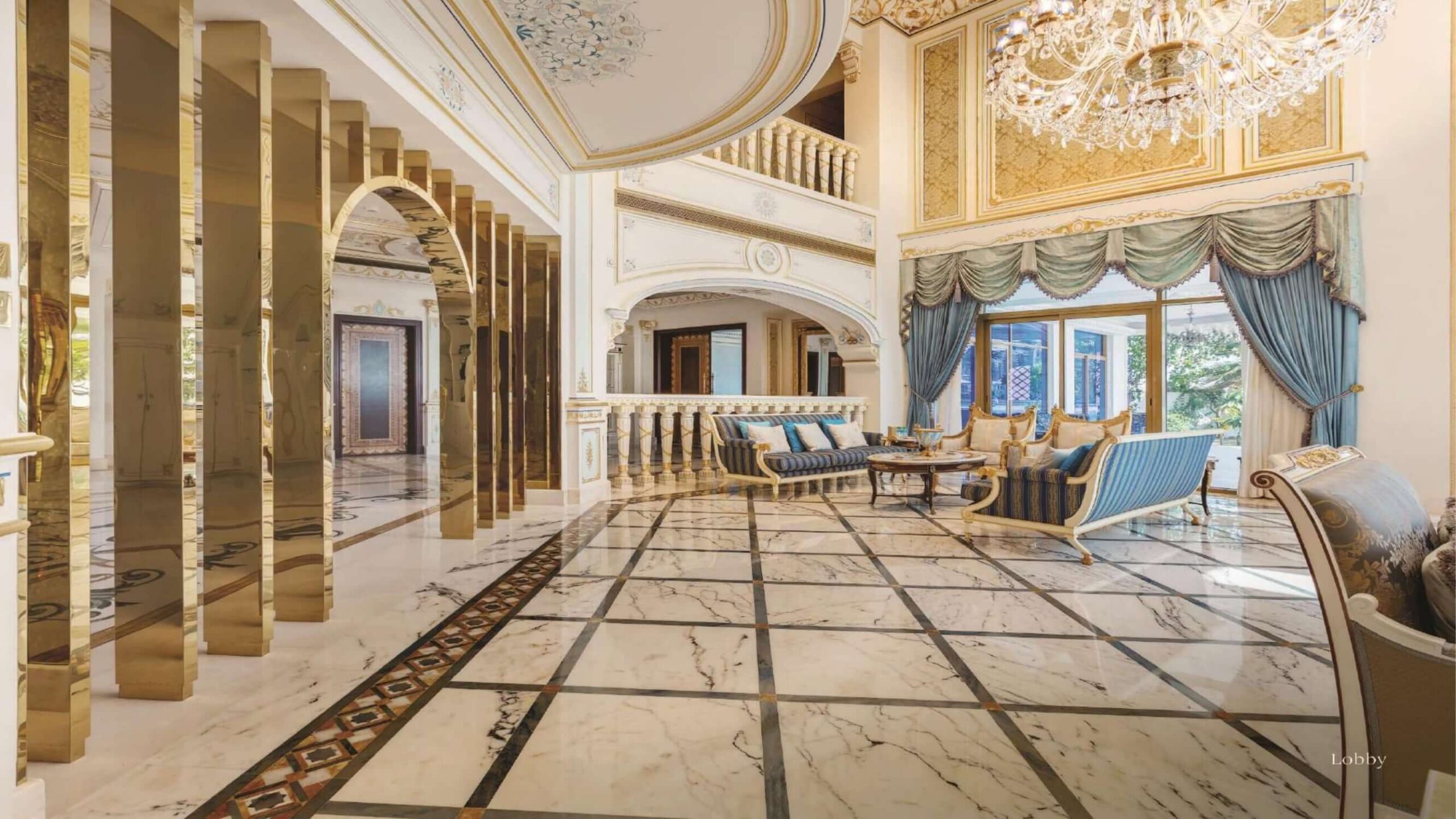 luxury villa lobby with chandelier and marble floors