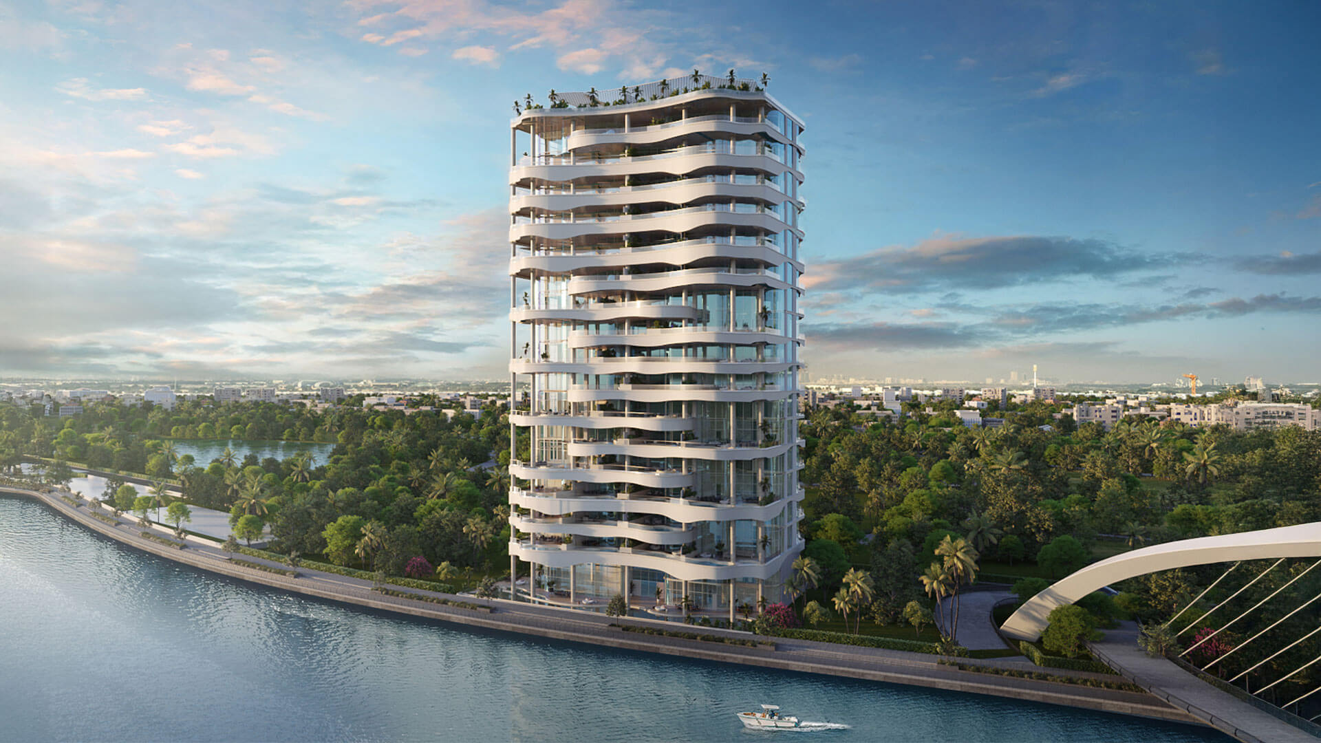 Full exterior view of One Canal Dubai tower overlooking Dubai Water Canal with modern design and landscaped surroundings
