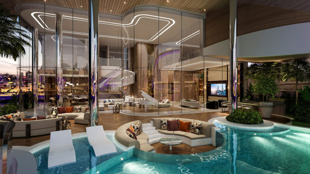 Luxury poolside lounge at One Canal Dubai with glass façade, private seating area, and elegant interior design