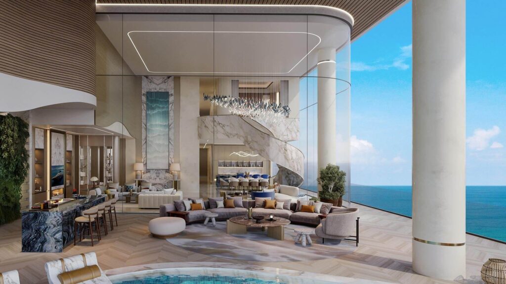 Grand living area at One Crescent Dubai with ocean views, luxury finishes, and modern spiral staircase